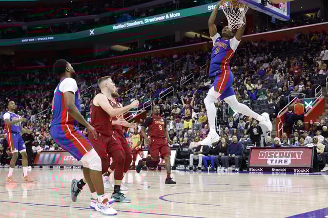 Mar 28, 2025; Detroit, Michigan, USA;  Detroit Pistons forward Ausar Thompson (9) dunks in the first half against the Cleveland Cavaliers at Little Caesars Arena. Mandatory Credit: Rick Osentoski-Imagn Images