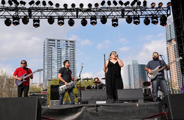 Stephanie Bergara, second from right, and other members of the Selena tribute band Bidi Bidi Banda perform at the South by Southwest festival in Austin, Texas.