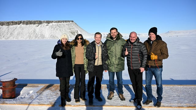 U.S. Vice President JD Vance poses with second lady Usha Vance, National Security Advisor Mike Waltz, his wife , former homeland security advisor, Julia Nesheiwat and Secretary of Energy Chris Wright as they tour the US military's Pituffik Space Base in Greenland on March 28, 2025. Jim Watson/Pool via REUTERS