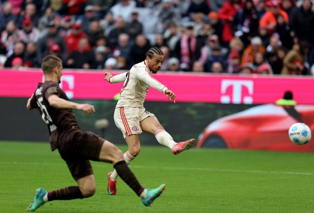 Leroy Sane (R) scored twice as Bayern Munich beat St Pauli to restore their six-point Bundesliga lead