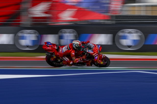 Mar 29, 2025; Austin, TX, USA; Marc Marquez (93) of Spain and Ducati Lenovo Team rides during qualifying for the 2025 MotoGP Grand Prix of the Americas at Circuit of The Americas. Mandatory Credit: Jerome Miron-Imagn Images