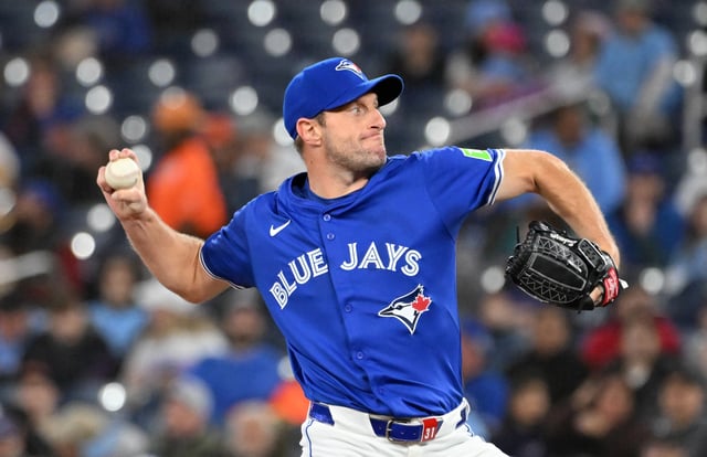 Mar 29, 2025; Toronto, Ontario, CAN; Toronto Blue Jays starting pitcher Max Scherzer (31) delivers a pitch against the Baltimore Orioles in the first inning at Rogers Centre. Dan Hamilton-Imagn Images