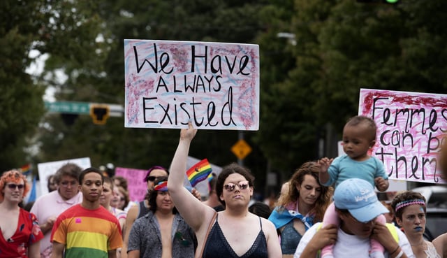 File Photo: Transgender and non-binary individuals, and their allies, march during a transgender rights march in Atlanta, Georgia, on October 12, 2019.