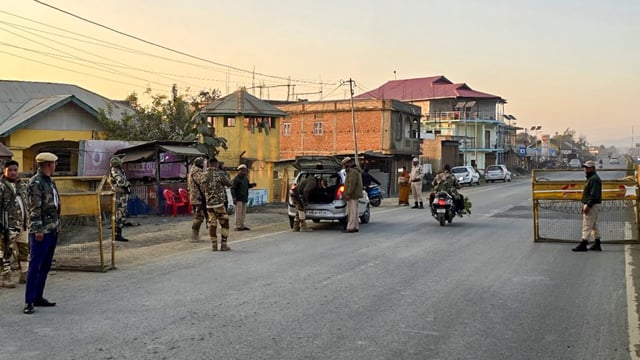 Security personnel during a search operation and area domination in the fringe and vulnerable areas of hill and valley districts, in Manipur.