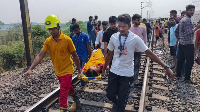 Rescue operation underway after 11 coaches of the SMVT Bengaluru-Kamakhya AC Express derailed near Cuttack in Odisha on Sunday. (PTI)