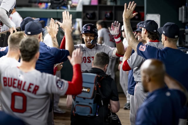 ARLINGTON, TEXAS - MARCH 29: Kristian Campbell #29 of the Boston Red Sox reacts after hitting his first Major League home run during the fourth inning of a game against the Texas Rangers on March 29, 2025 at Globe Life Field in Arlington, Texas. (Photo by Maddie Malhotra/Boston Red Sox/Getty Images)