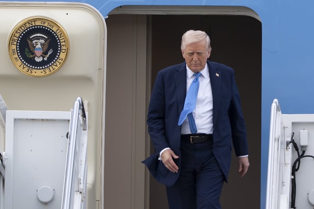 President Donald Trump arrives on Air Force One at Palm Beach International Airport, Friday, March 28, 2025, in West Palm Beach, Fla. (AP Photo/Manuel Balce Ceneta)