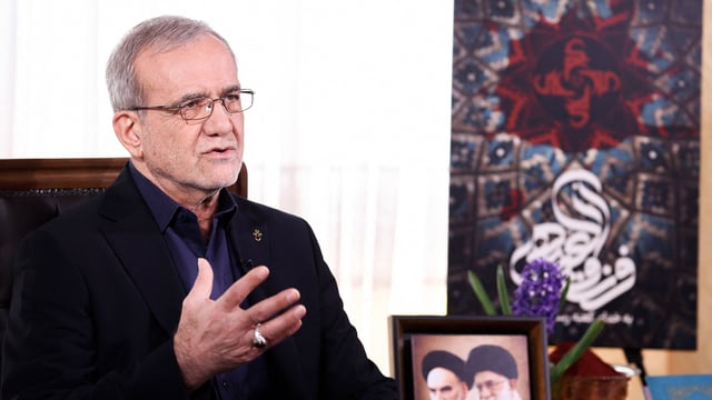 Iranian presidency shows the Islamic republic's President Masoud Pezeshkian during the annual address to the nation for Nowruz, the Persian New Year, in Tehran on March 20, 2025.