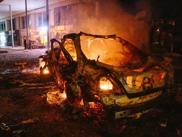 A car burns after a drone strike, in Kharkiv, Ukraine, on March 29, 2025. At least two people were killed and more than 25 were injured in the Russia attack with Shahed-type drones in Kharkiv. (Photo by Pavlo Pakhomenko/NurPhoto via Getty Images).