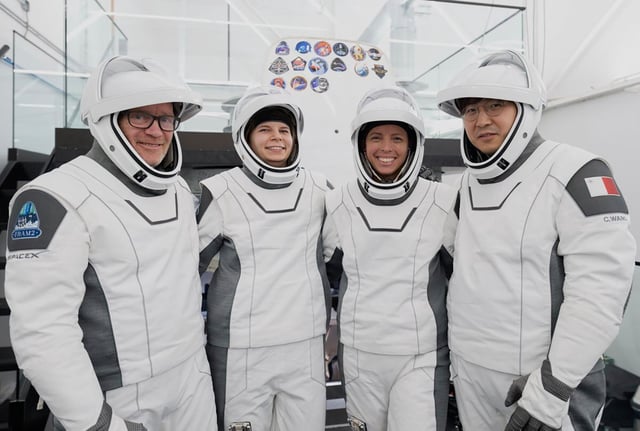 The Fram2 crew poses in this image provided by SpaceX. The group includes, from left, Eric Philips, a polar guide from Australia; Rabea Rogge, a robotics researcher from Germany; Norwegian filmmaker Jannicke Mikkelsen; and Chun Wang, a Chinese-born bitcoin investor who is paying for the whole spaceflight.