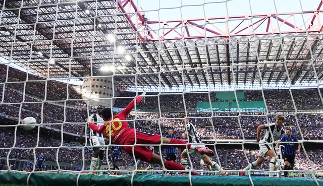 Soccer Football - Serie A - Inter Milan v Udinese - San Siro, Milan, Italy - March 30, 2025 Inter Milan's Marko Arnautovic scores their first goal REUTERS/Jennifer Lorenzini