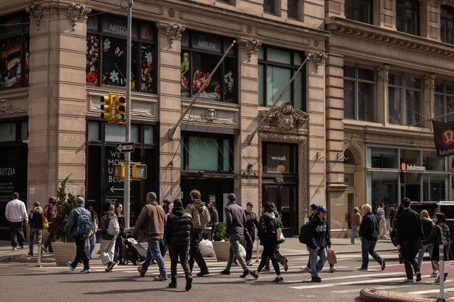 Shoppers crossing the street in Soho