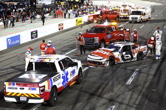 Sammy Smith, driver of the #8 Pilot Chevrolet, is assisted by the American Medical Response (AMR) safety team after an on-track incident to end the NASCAR Xfinity Series US Marine Corps 250 at Martinsville Speedway on March 29, 2025 in Martinsville, Virginia.