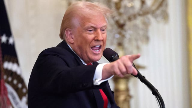 U.S. President Donald Trump gestures while speaking during a Women&#39;s History Month event in the East Room of the White House on March 26, 2025 in Washington, DC.