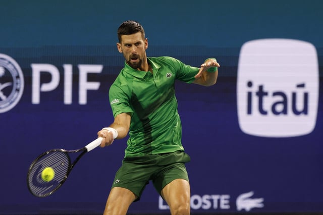 Mar 30, 2025; Miami, FL, USA; Novak Djokovic (SRB) hits a forehand against Jakub Mensik (CZE)(not pictured) in the men's singles championship of the Miami Open at Hard Rock Stadium. Mandatory Credit: Geoff Burke-Imagn Images