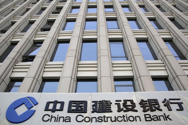 A sign of China Construction Bank is seen at a branch in Beijing, China, April 21, 2016. REUTERS/Kim Kyung-Hoon/File Photo