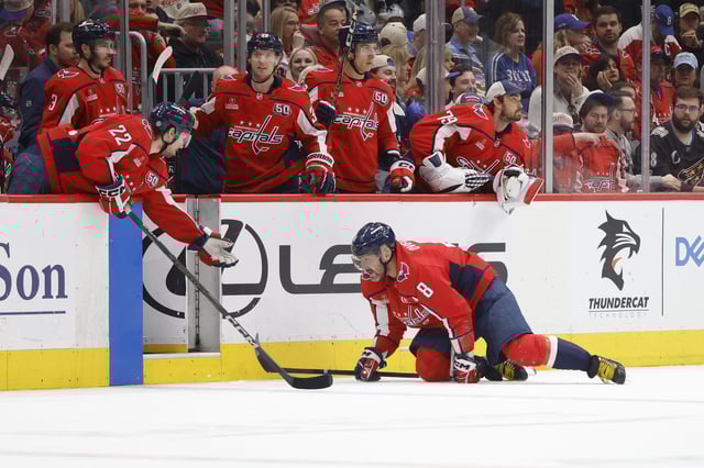 Mar 30, 2025; Washington, District of Columbia, USA; Washington Capitals left wing Alex Ovechkin (8) crawls off the ice after loosing a blade during the third period against the Buffalo Sabres at Capital One Arena. Mandatory Credit: Amber Searls-Imagn Images