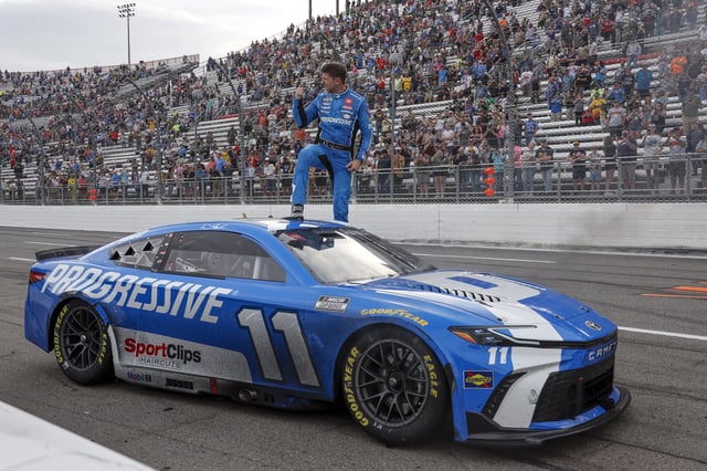 Denny Hamlin, driver of the #11 Progressive Toyota, celebrates after winning the NASCAR Cup Series Cook Out 400 at Martinsville Speedway on March 30, 2025 in Martinsville, Virginia.