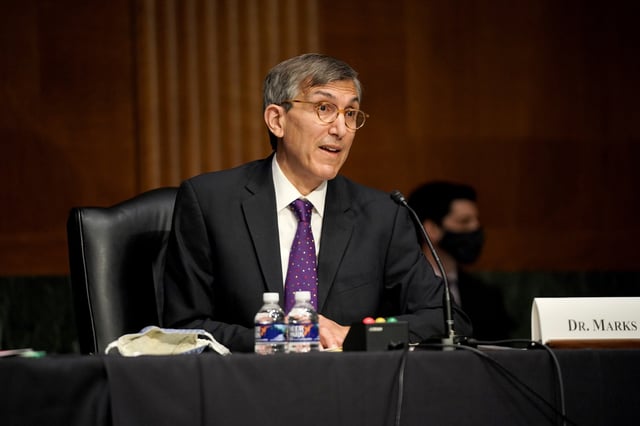 Dr. Peter Marks, Director of the Center for Biologics Evaluation and Research within the Food and Drug Administration gives an opening statement during a Senate Health, Education, Labor and Pensions Committee hearing to discuss the on-going federal response to COVID-19, at the U.S. Capitol in Washington, D.C., U.S., May 11, 2021. Greg Nash/Pool via REUTERS