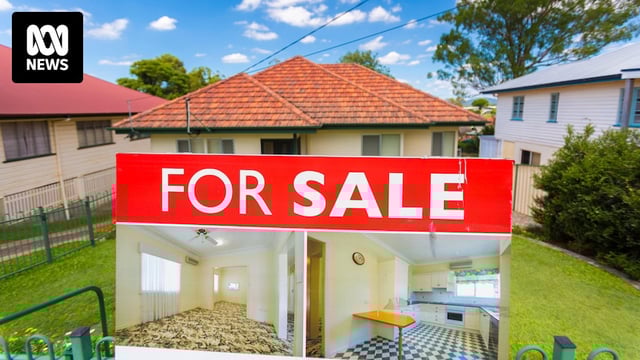 a house for sale in the brisbane suburb of stafford with the sale sign in the front yard 