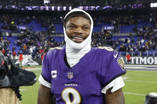 Jan 11, 2025; Baltimore, Maryland, USA; Baltimore Ravens quarterback Lamar Jackson (8) celebrates after defeating the Pittsburgh Steelers in an AFC wild card game at M&T Bank Stadium. Mandatory Credit: Geoff Burke-Imagn Images/File Photo