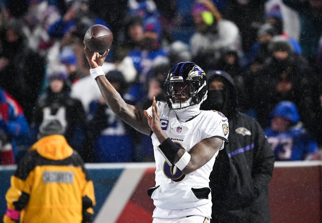 Jan 19, 2025; Orchard Park, New York, USA; Baltimore Ravens quarterback Lamar Jackson (8) throws the ball during warm ups before the game against the Buffalo Bills in a 2025 AFC divisional round game at Highmark Stadium. Mandatory Credit: Mark Konezny-Imagn Images/File Photo