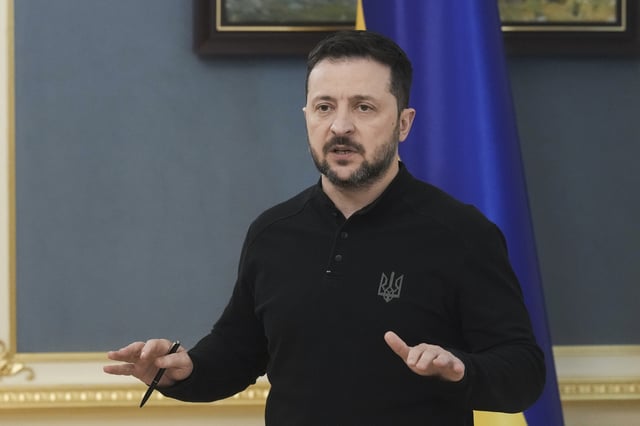 Ukrainian President Volodymyr Zelenskyy speaks during a briefing in Kyiv, Ukraine, Friday, March 28, 2025. (AP Photo/str)
