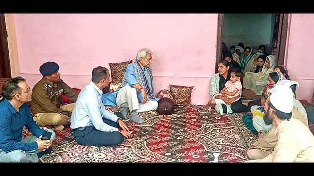 Jammu and Kashmir lieutenant governor Manoj Sinha meets the family members of a police personnel who dies during the Kathua anti-terrorist operation, on Monday. (Photo: Office of LG J&K-X)
