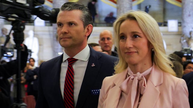 U.S. Secretary of Defense Pete Hegseth and his wife Jennifer Rauchet walk through Statuary Hall prior to U.S. President Donald Trump&#39;s speech to a joint session of Congress at the U.S. Capitol in Washington, D.C., U.S., March 4, 2025.