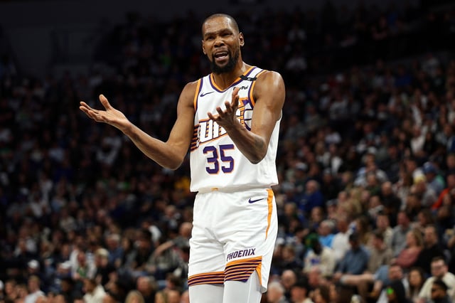 Kevin Durant #35 of the Phoenix Suns reacts against the Minnesota Timberwolves in the first quarter at Target Center on March 28, 2025 in Minneapolis, Minnesota.