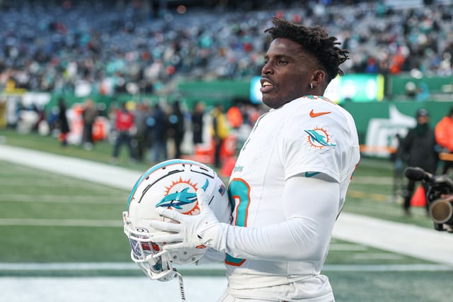 Jan 5, 2025; East Rutherford, New Jersey, USA; Miami Dolphins wide receiver Tyreek Hill (10) on the field before the game against the New York Jets at MetLife Stadium. Mandatory Credit: Vincent Carchietta-Imagn Images/File Photo