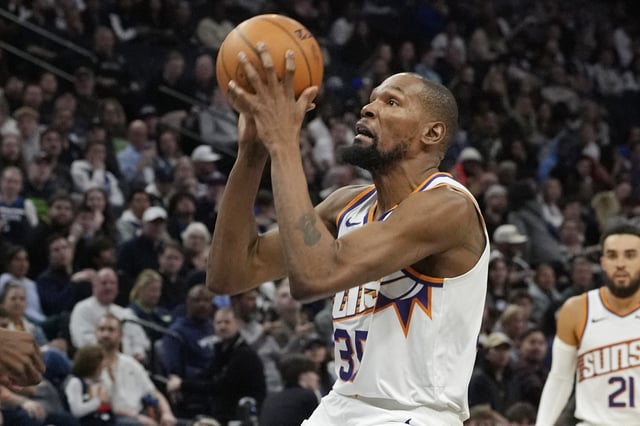 Mar 28, 2025; Minneapolis, Minnesota, USA; Phoenix Suns forward Kevin Durant (35) shoots against the Minnesota Timberwolves in the third quarter at Target Center. Mandatory Credit: Bruce Kluckhohn-Imagn Images/File Photo