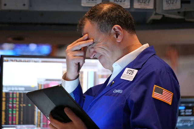 A trader on the floor at the New York Stock Exchange in New York, on March 31, 2025. 