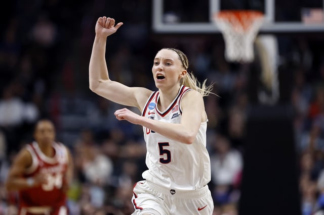 UConn is heavily favored in tonight&#39;s NCAAW Elite Eight matchup after back-to-back historic scoring nights by star guard Paige Bueckers.
