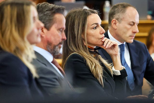 From left, Attorney Emily Little, Alan Jackson, Karen Read and David Yanetti in Norfolk Superior Court at Dedham, on Feb. 25, 2025. 