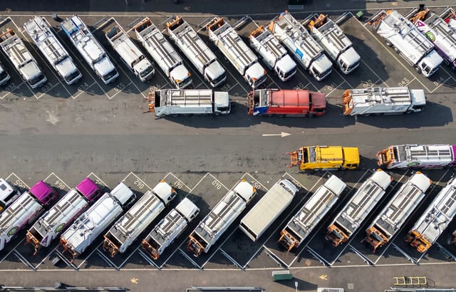A drone view shows rows of trucks parked in a council depot as strike action by Birmingham bin workers enters its third week in Birmingham, England, on March 24.