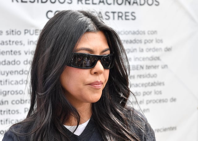 Kourtney Kardashian is seen at a protest to stop recent wildfire waste being sent to the Calabasas Landfill in Los Angeles, California.