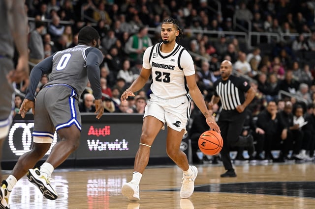 Jan 3, 2024; Providence, Rhode Island, USA; Providence Friars forward Bryce Hopkins (23) dribbles the ball against Seton Hall Pirates guard Dylan Addae-Wusu (0) during the first half at Amica Mutual Pavilion. Mandatory Credit: Eric Canha-USA TODAY Sports/File Photo