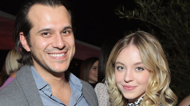 Jonathan Davino (L) and Sydney Sweeney attend the InStyle and Kate Spade dinner at Spring Place on October 23, 2018 in Los Angeles, California.