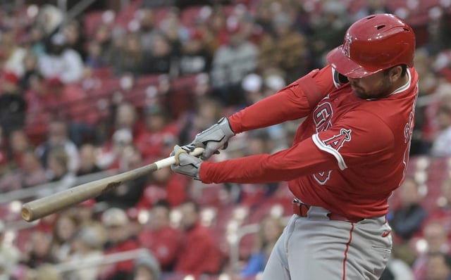 The Angels’ Nolan Schanuel hits a single during the first inning of their game against the St. Louis Cardinals on Monday night in St. Louis. Schanuel went 2 for 5 with an RBI in a 5-4, 10-inning victory. (AP Photo/Michael Thomas)