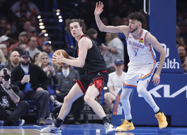 Mar 31, 2025; Oklahoma City, Oklahoma, USA; Oklahoma City Thunder forward Chet Holmgren (7) defends Chicago Bulls guard Josh Giddey (3) during the second quarter at Paycom Center. Mandatory Credit: Alonzo Adams-Imagn Images