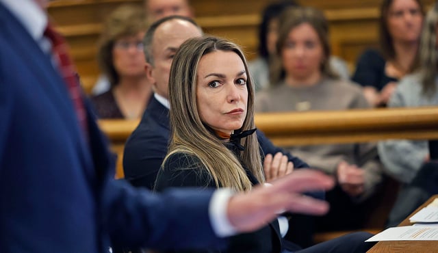 Karen Read watches attorney Robert Alessi make a point during her trial at Norfolk Superior Court at Dedham, Mass., on Tuesday, Feb. 25, 2025.  (Greg Derr/The Patriot Ledger via AP, Pool)