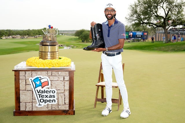 Akshay Bhatia of the United States poses with the trophy after winning the Valero Texas Open on the 18th hole of the first playoff during the final round of the Valero Texas Open at TPC San Antonio on April 07, 2024 in San Antonio, Texas.