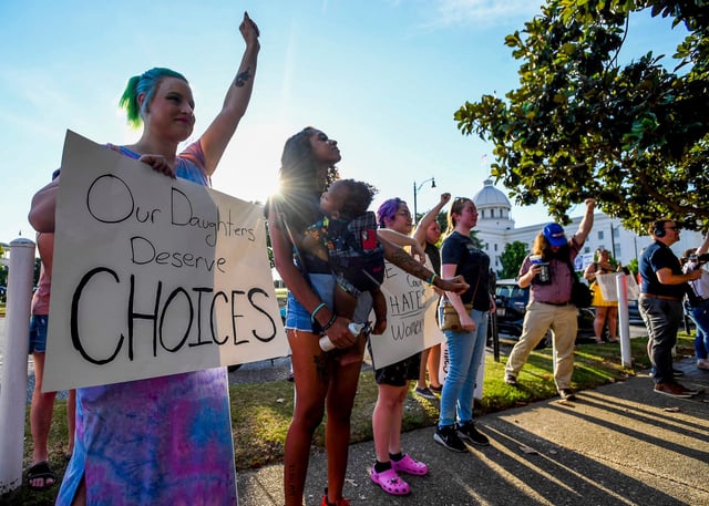 Protestors chant during an abortion rights rally on the grounds of the Alabama Statehouse in Montgomery, Ala., on Friday June 24, 2022. About 100 protestors showed up tp protest the overturning of Roe v Wade by the U.S. Supreme Court.

Rally04