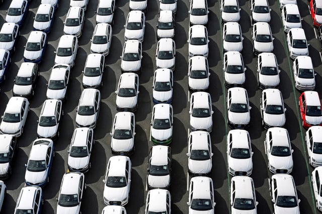 Volkswagen export cars are seen in the port of Emden, beside the VW plant, Germany March 9, 2018.  REUTERS/Fabian Bimmer/File Photo