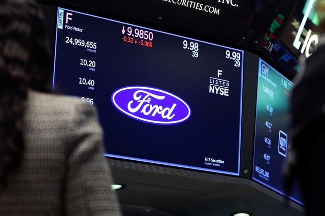 Screens display the trading information for Ford and General Motors (GM) stock on the floor at the New York Stock Exchange (NYSE) in New York City, U.S., March 27, 2025.  REUTERS/Brendan McDermid