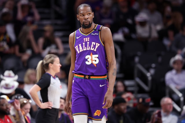 Kevin Durant #35 of the Phoenix Suns looks on during the second half against the Houston Rockets at PHX Arena on March 30, 2025 in Phoenix, Arizona. The Rockets defeated the Suns 148-109. The 15-time All-Star forward is reportedly open to staying in Phoenix long-term.