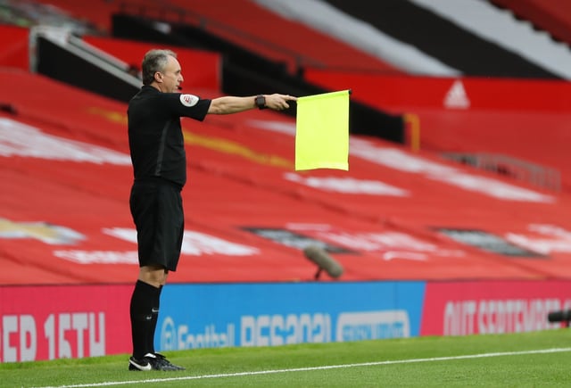 Soccer Football - Premier League - Manchester United v West Ham United - Old Trafford, Manchester, Britain - July 22, 2020  Assistant referee signals offside. Pool via REUTERS/Catherine Ivill/File Photo