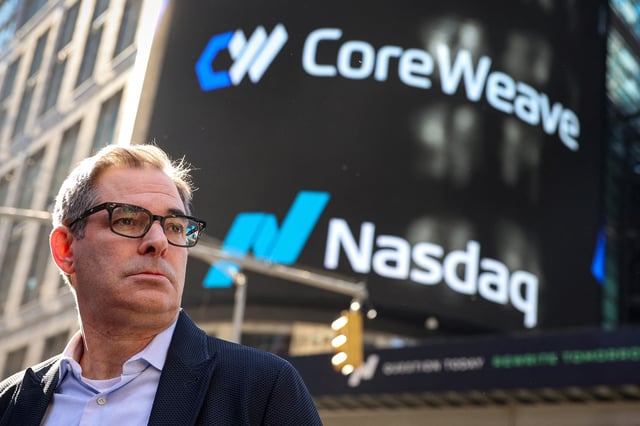 Michael Intrator, Founder & CEO of CoreWeave, Inc., Nvidia-backed cloud services provider, attends his company's IPO at the Nasdaq Market, in New York City, U.S., March 28, 2025. REUTERS/Brendan McDermid/File Photo