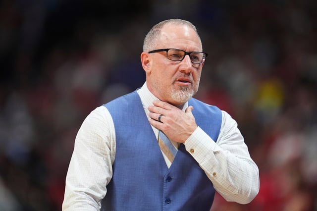 Texas A&amp;M head coach Buzz Williams looks on against Michigan during the second half in the second round of the NCAA college basketball tournament Saturday, March 22, 2025, in Denver. (AP Photo/David Zalubowski)